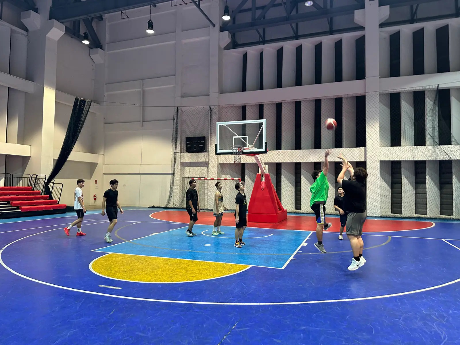 A shot goes up on the big indoor court