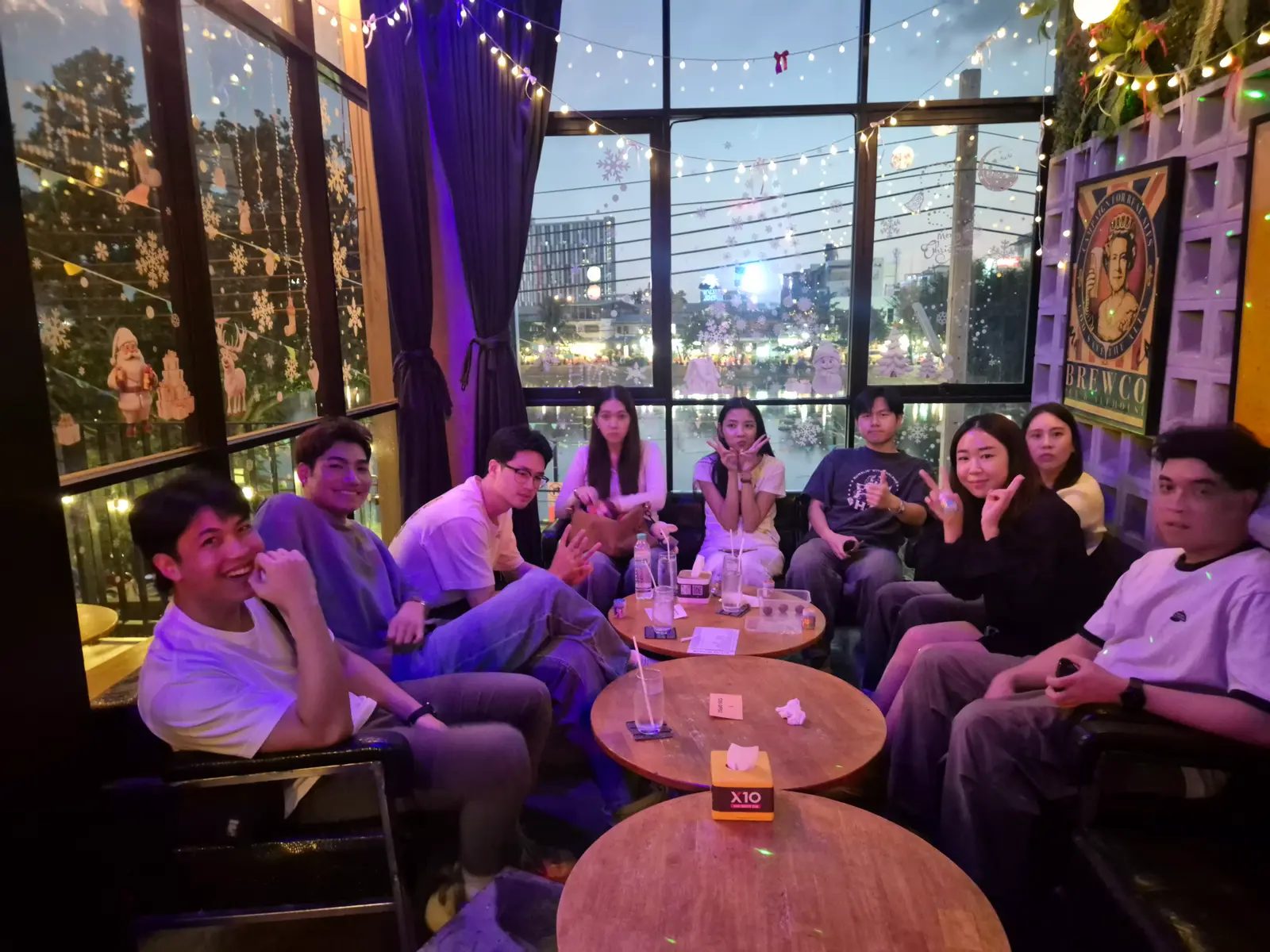 Colleagues relaxing at a table before dinner