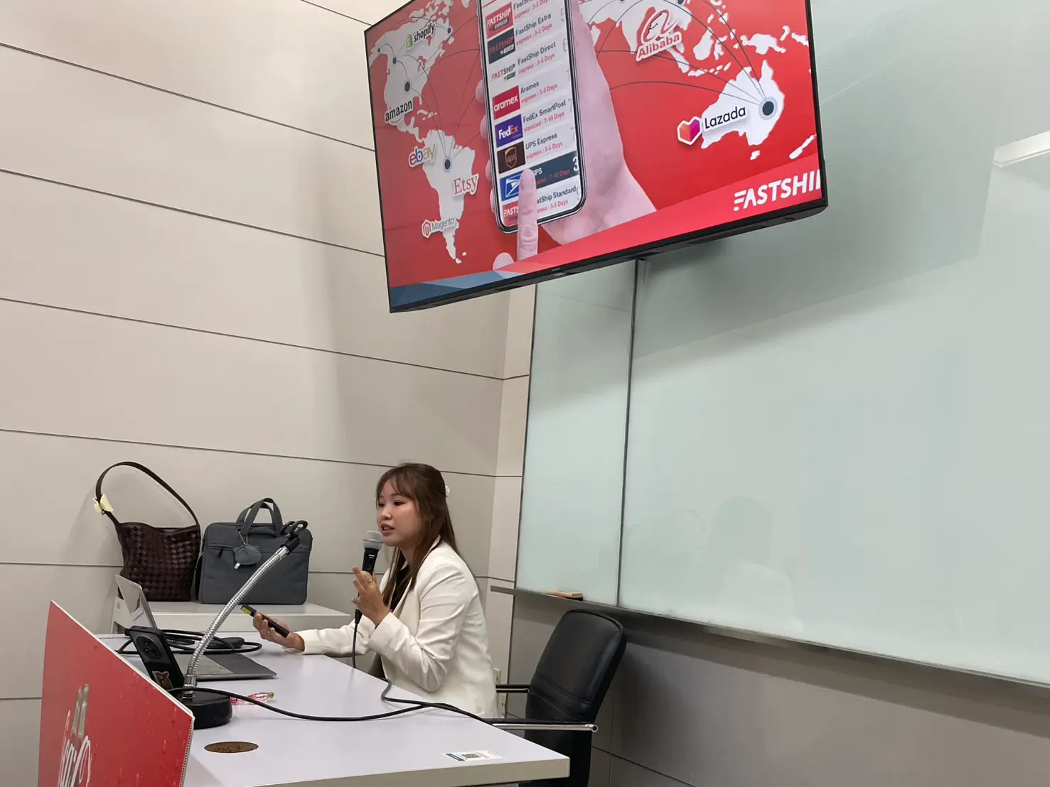 A team member answers questions from the students