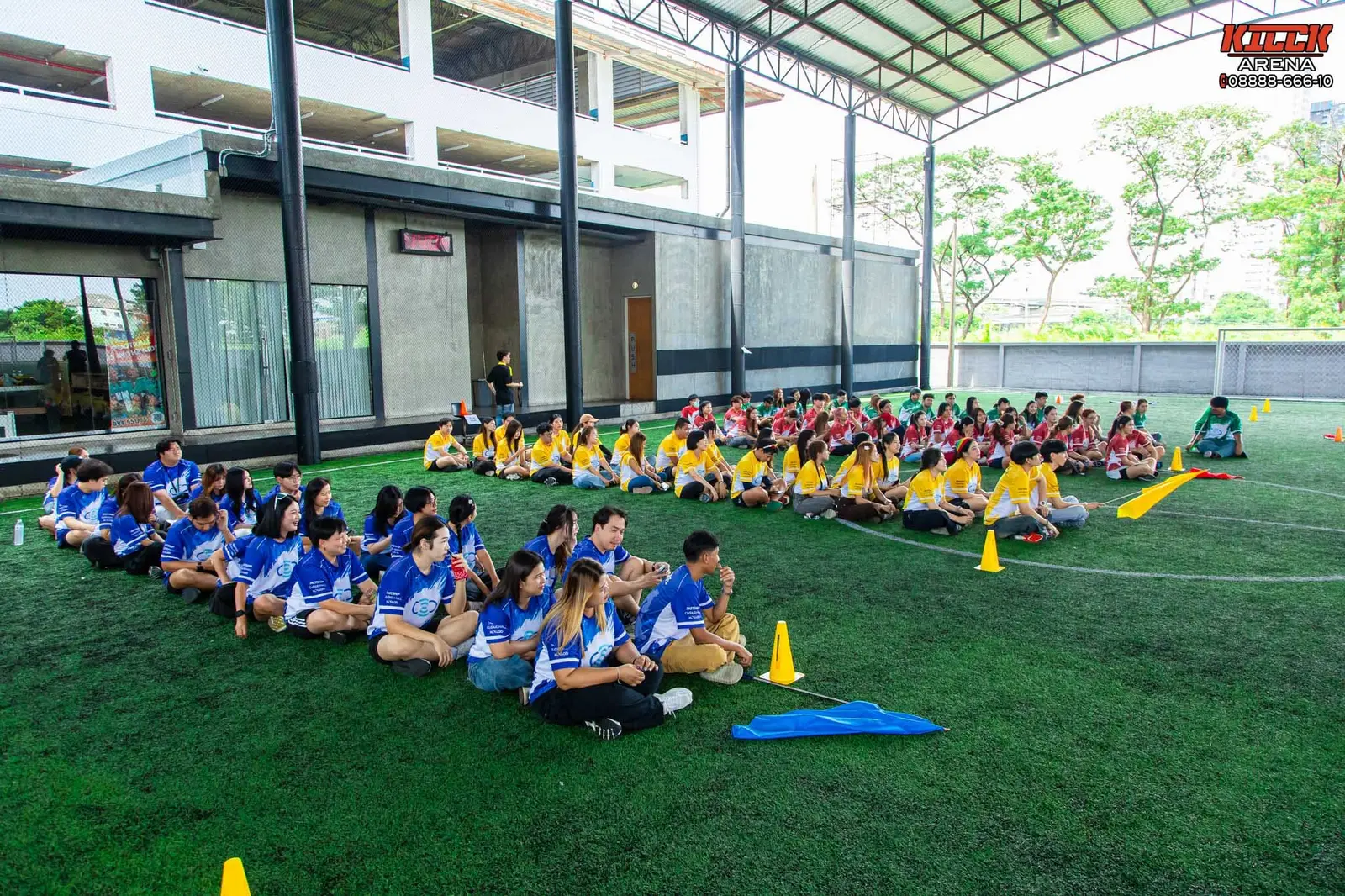 Teams seated in rows, waiting for their turn