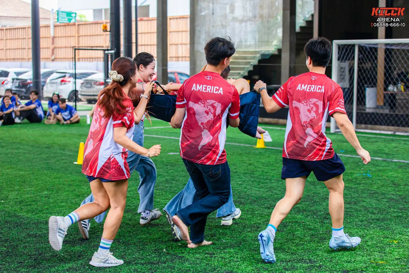 Red team players racing in a group