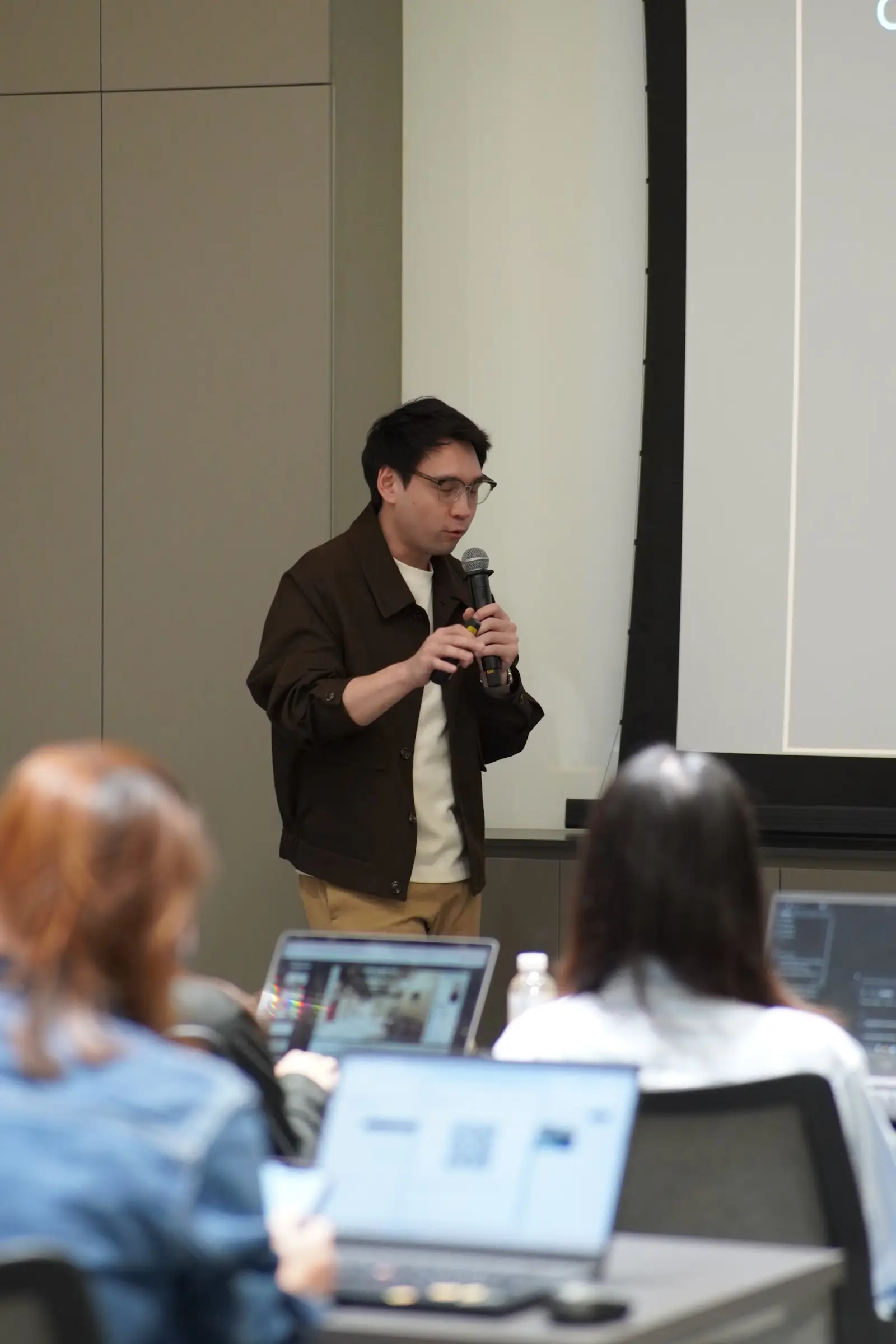 A speaker walks through a workflow