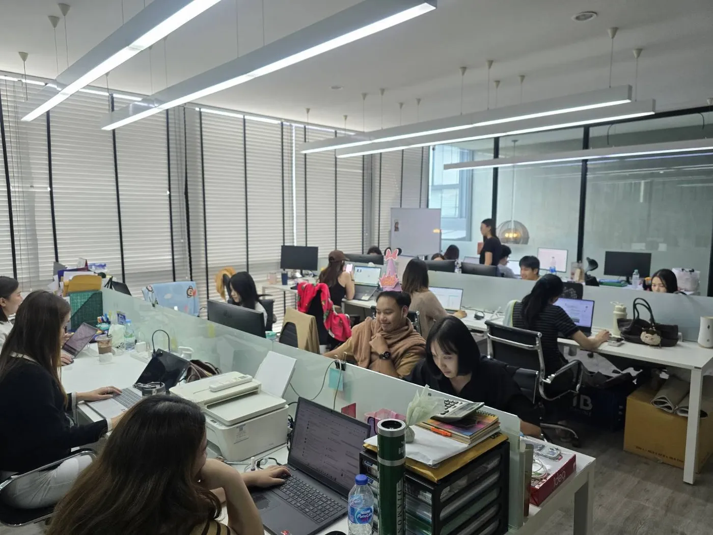 The team at work on an open-plan floor at head office