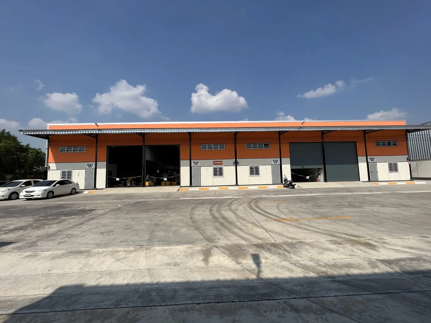 The warehouse: FastShip-branded bays D24–D27